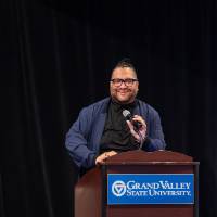 speaker on stage at podium